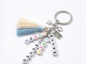 Cuentas plasticas pastilla blanca numero negro